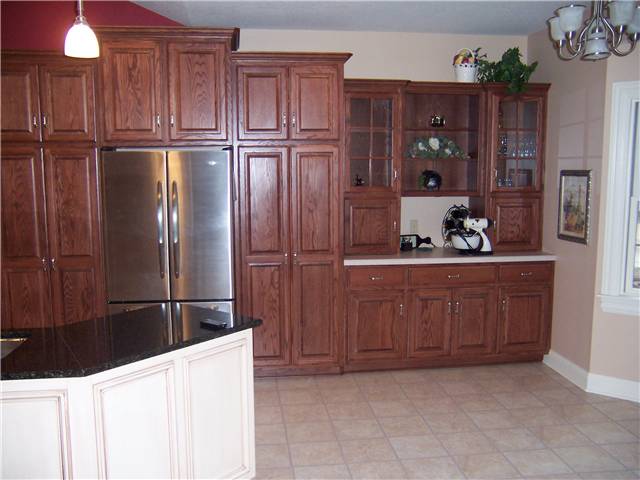Red oak cabinets - raised panel doors - Standard overlay style